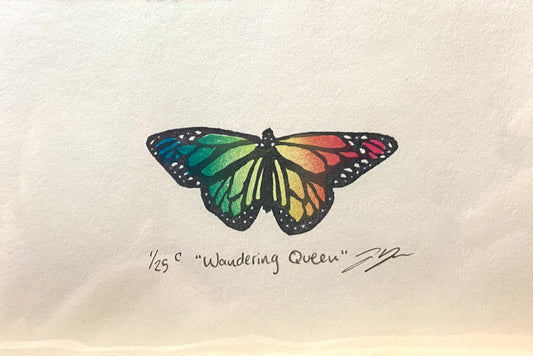 A rainbow-colored relief print of a monarch butterfly, made by hand using a carved eraser. The print is numbered, signed, and titled "Wandering Queen".