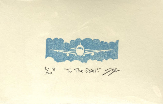 A small blue print depicting an airplane headed toward the viewer, with cloud-shaped borders.  The print is made by hand using a carved eraser and is numbered, titled and signed.
