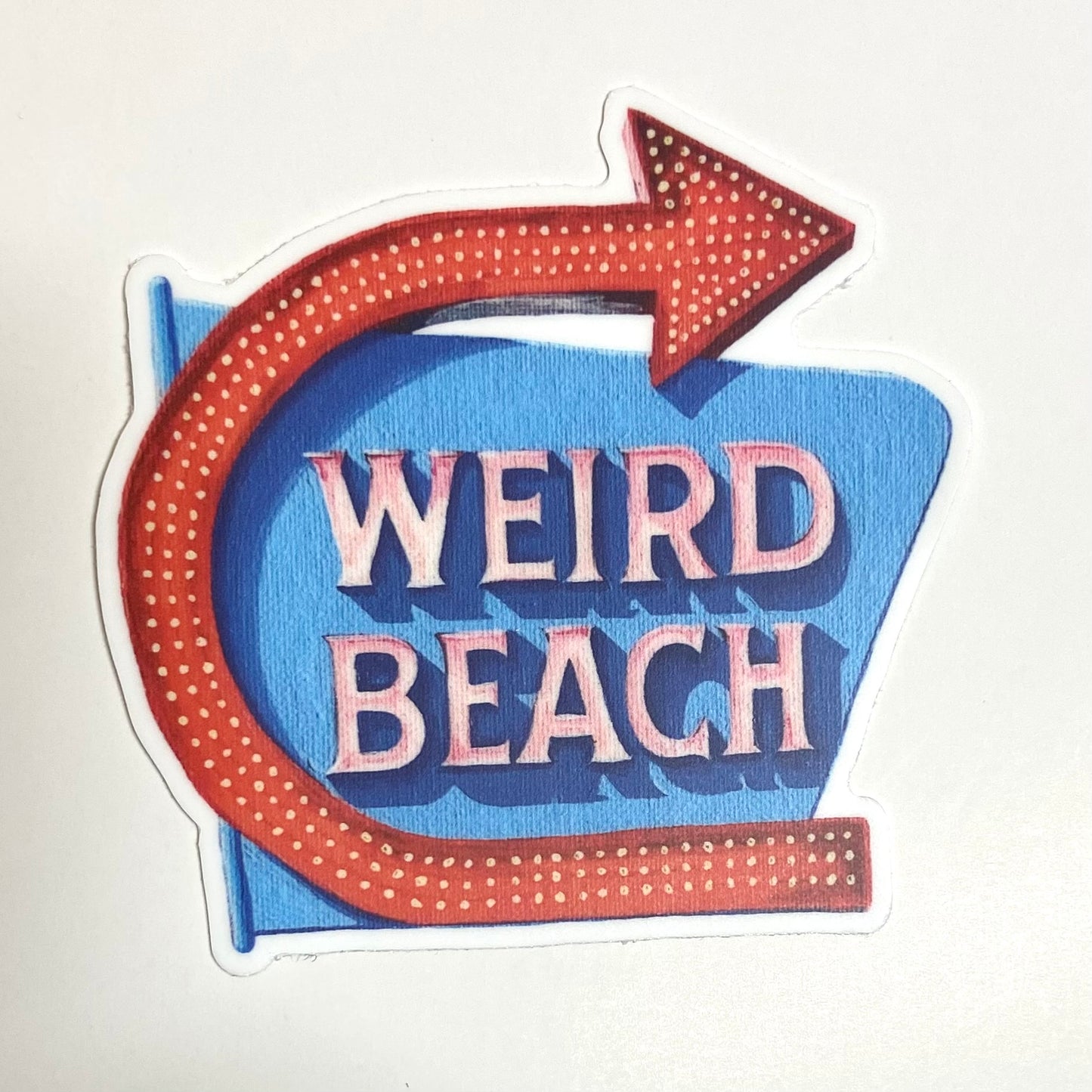 A sticker of the iconic Weirs Beach sign reading WEIRD BEACH.