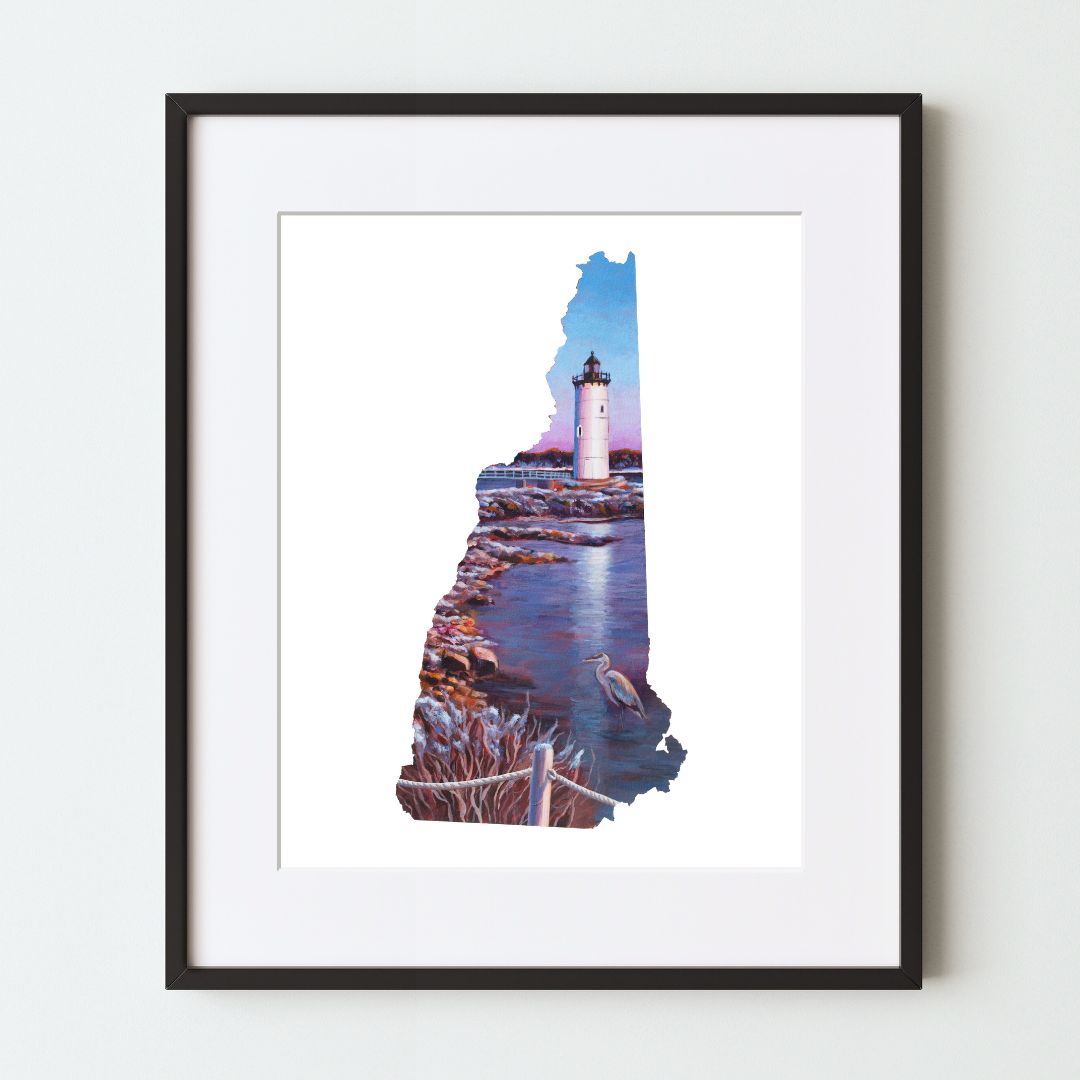 An art print of a New Hampshire-shaped painting, depicting a lighthouse by a rocky beach, digitally mocked up in a black frame with a white mat.