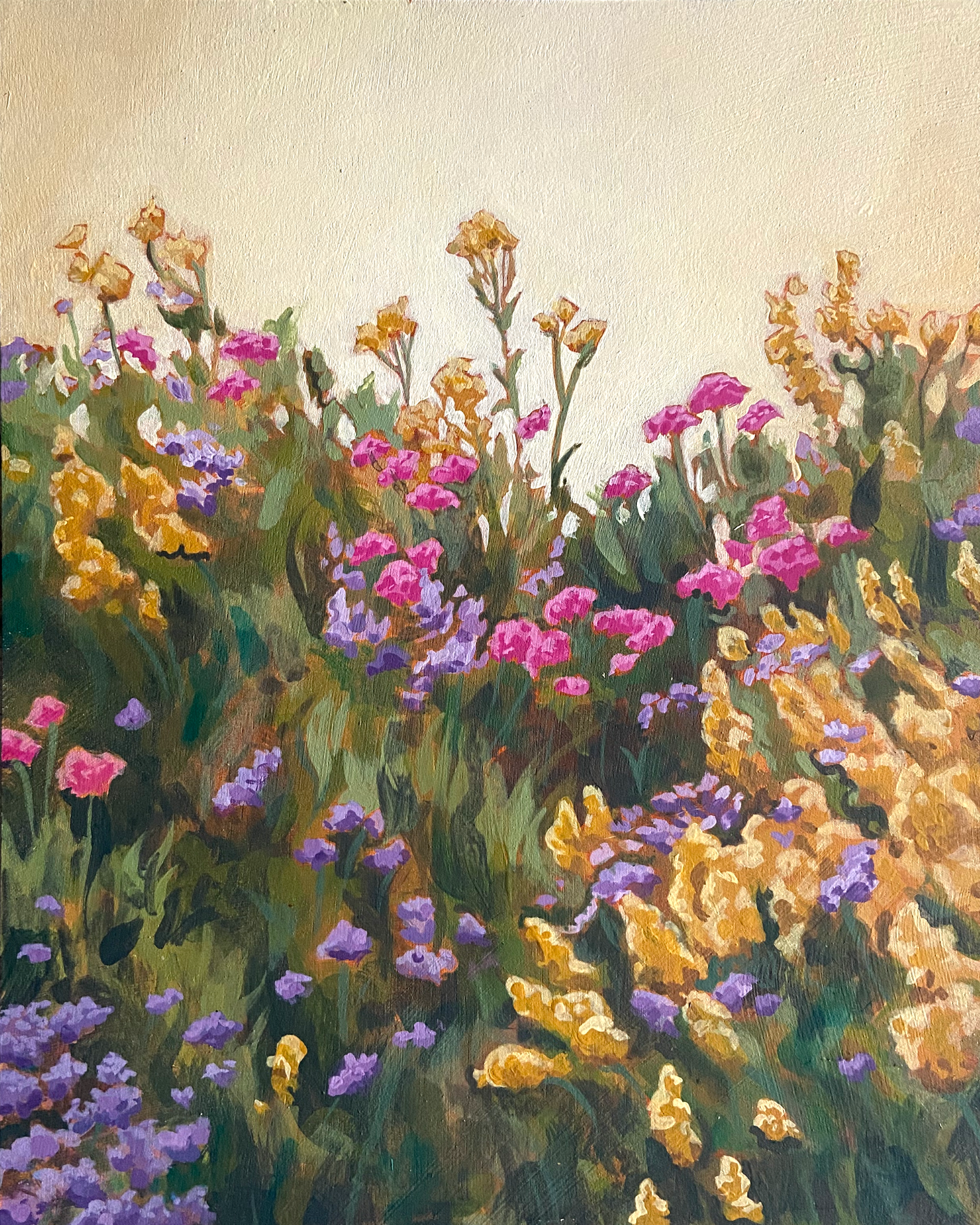 A painting of gold, pink and purple flowers in a lush green field in front of a bright golden sky. 