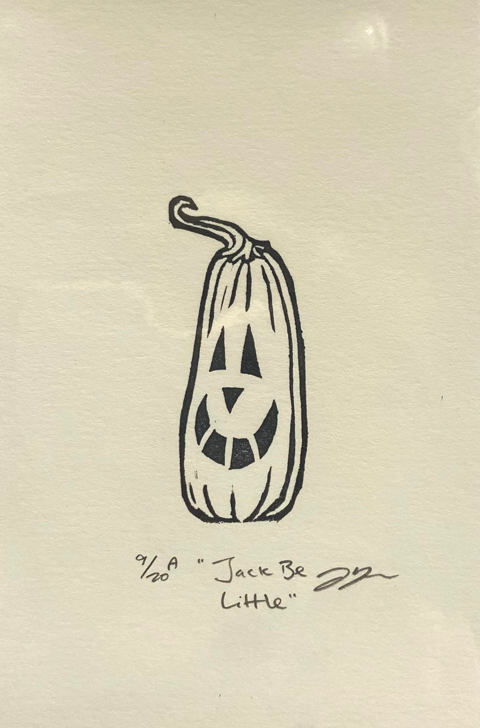 A small black-and-white print depicting a tall pumpkin with a carved jack-o-lantern face. The print is made by hand using a carved eraser and is numbered, titled and signed. 