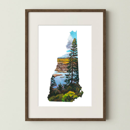 A mockup of the New Hampshire shaped landscape art print in a walnut frame with a white mat. The painting features a tall pine tree in front of a marsh with fall foliage and  a partly cloudy sky.