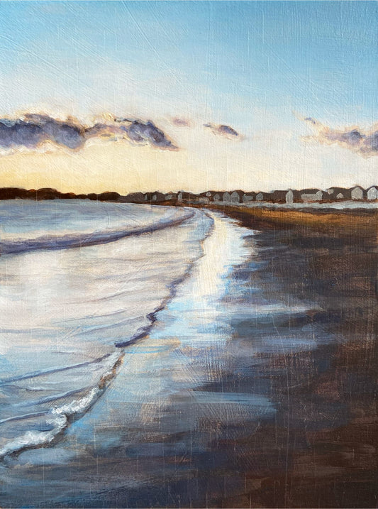 A vertically oriented painting of soft waves lapping the shore, reflecting the twilight in the sand. In the distance are a row of silhouetted beachfront houses. 