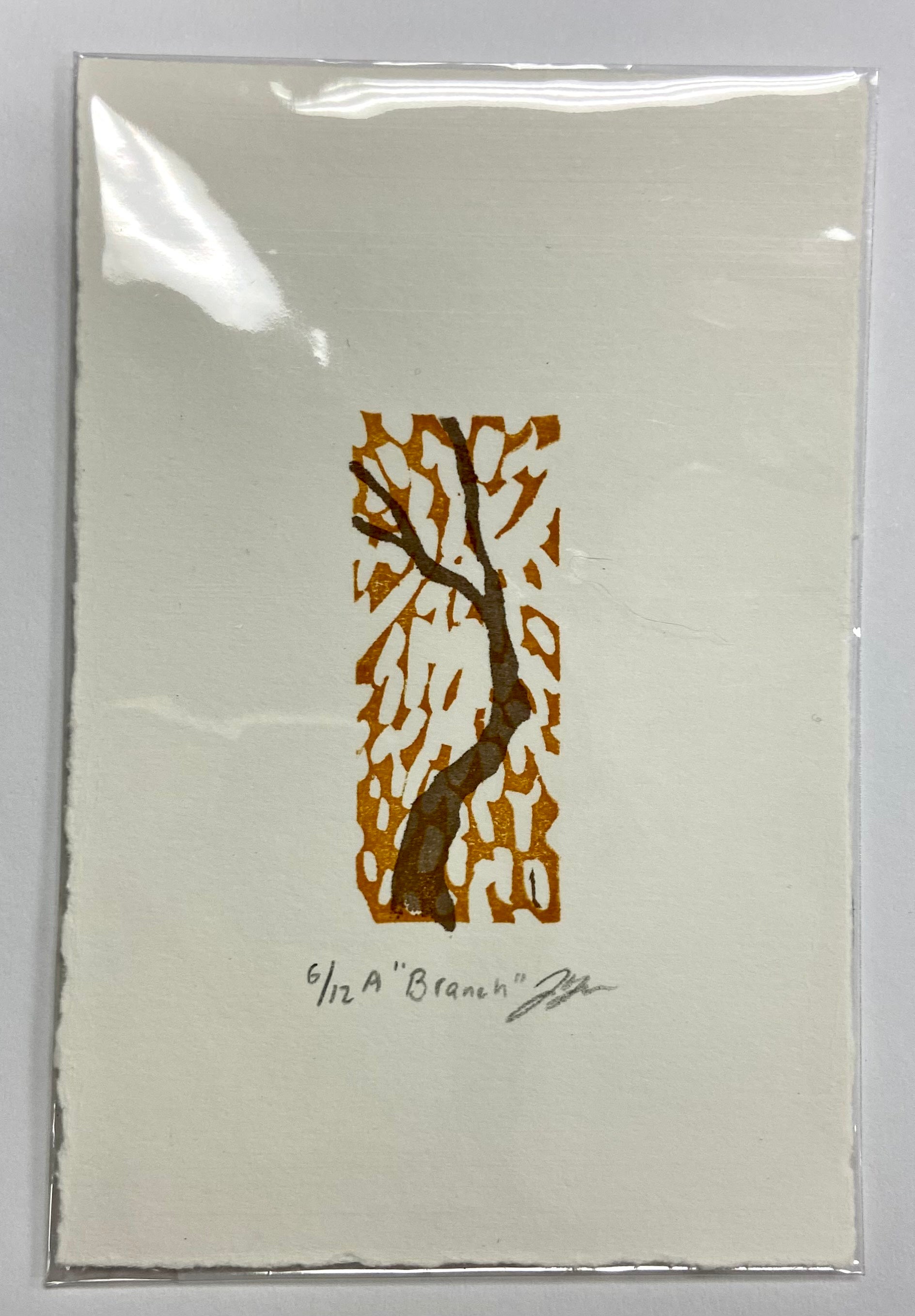 A two-layer relief print of a tree branch and abstract implied leaves. The print is made by hand with carved erasers and is numbered, signed and titled.