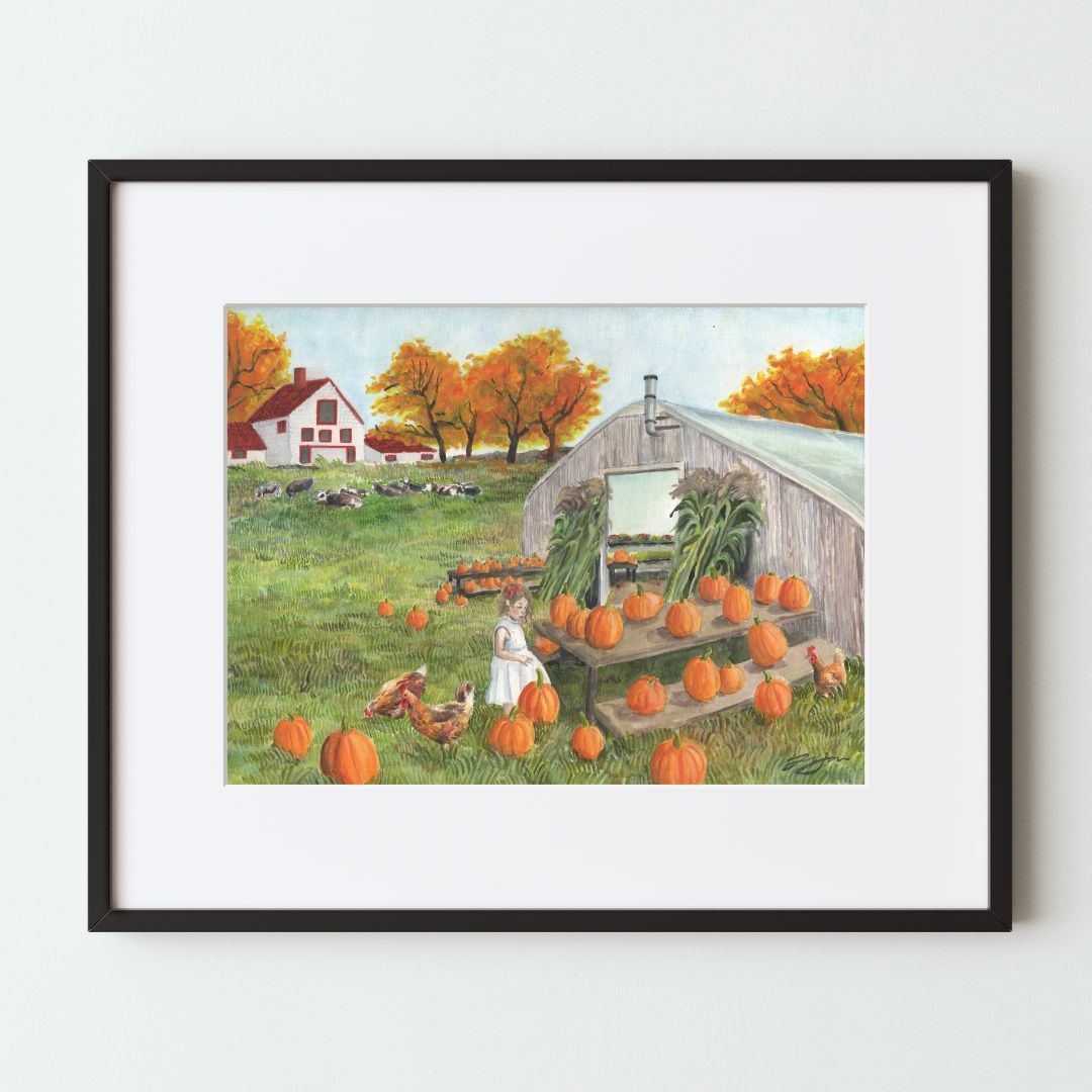 A mockup of a landscape art print in a black frame with a white mat. The painting shows a grassy hill with a greenhouse and pumpkin patch, a little girl and chickens browsing. Farther away, there is a white farmhouse, cows and orange fall foliage.